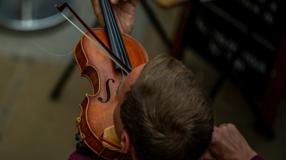 Violinist playing, seen from above